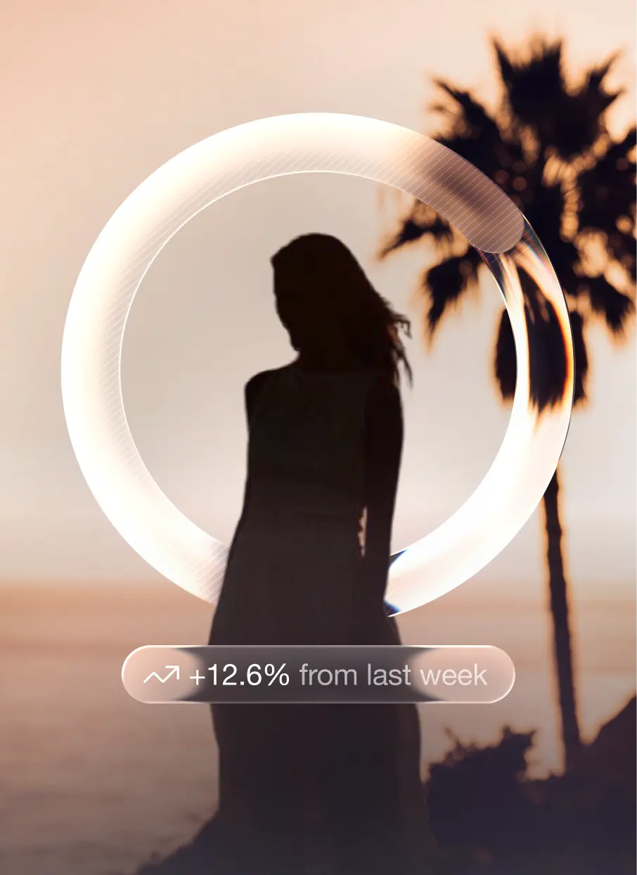 A woman on the shore inside a ring of light