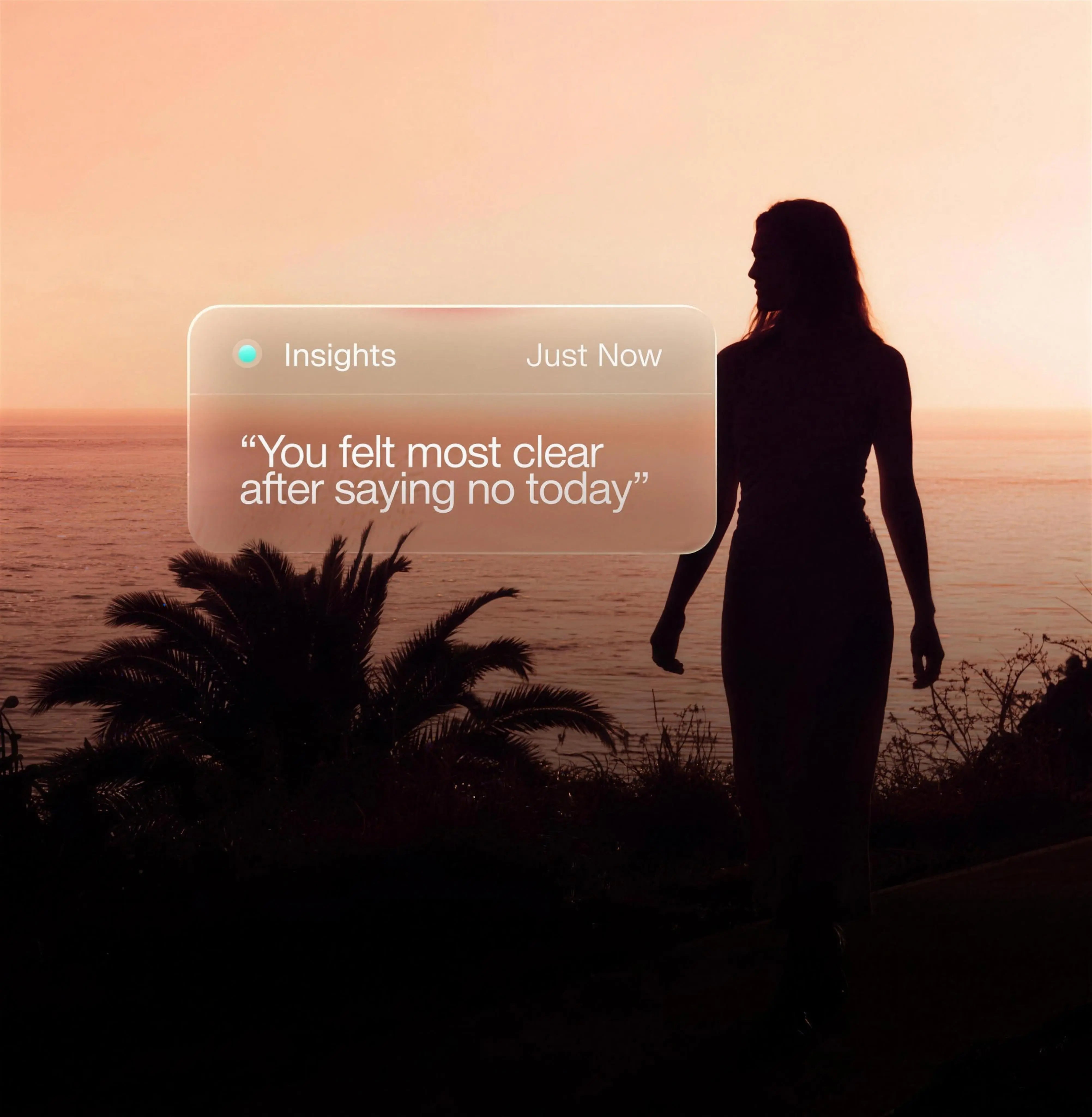 A woman overlooking the sea at sunset with a MANILAI insight